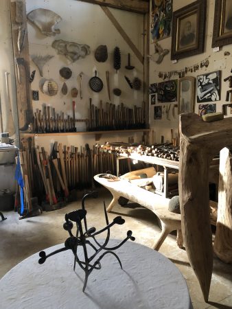 Studio Shot C - showing "Happy" sculpture, and many tools, 2022
